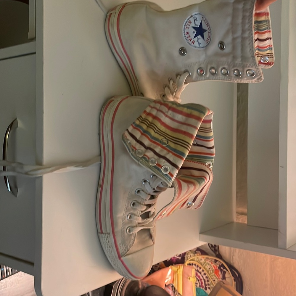 Gently worn white converse high tops that fold down